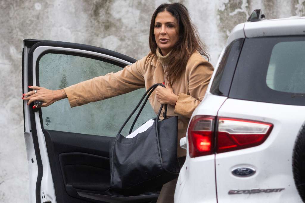(FILES) Judge Julieta Makintach --one of three judges presiding over Diego Armando Maradona’s death case, and who faces possible removal for allegedly being involved in a documentary on the trial-- gets off the car on arrival in court for a trial hearing in San Isidro, outskirts of Buenos Aires on May 27, 2025.