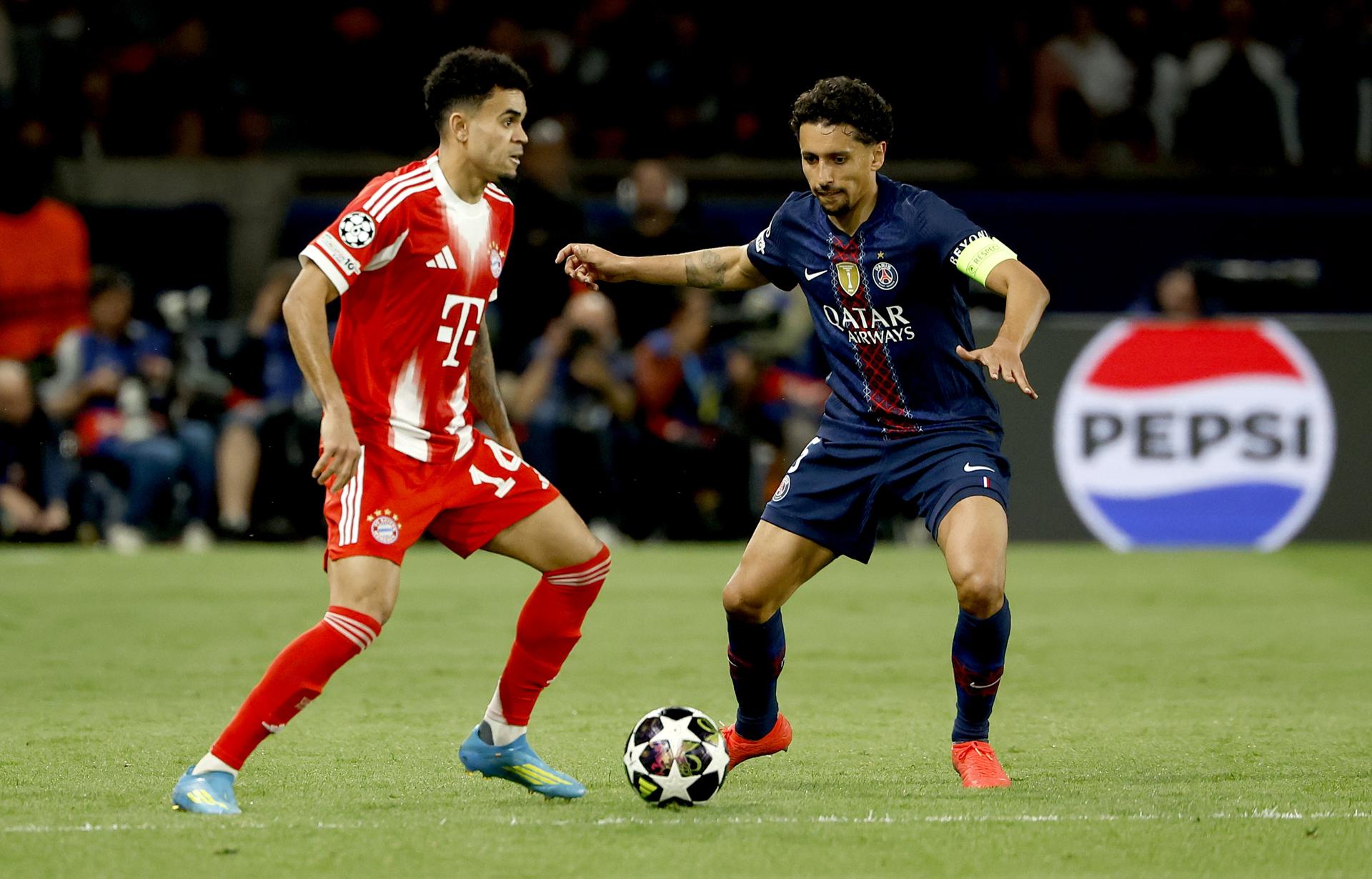 PARIS (France), 28/04/2026.- Marquinhos (R) of PSG in action against Luis Diaz of Bayern during the UEFA Champions League semi-final match between Paris Saint-Germain and Bayern Munich in Paris, France 28 April 2026. (Liga de Campeones, Francia) EFE/EPA/YOAN VALAT