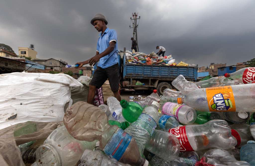Kathmandu (Nepal), 04/06/2024.- A man searches for recyclable items among plastic materials ahead of the World Environment Day at the Bishnumati River, in Kathmandu, Nepal, 04 June 2024 (issued 05 June 2024). Kathmandu, Lalitpur, and Bhaktapur, three densely populated cities which are part of the Kathmandu Valley, are experiencing rapid urbanization. World Environment Day (WED) is celebrated around the world on 05 June, with a focus on 'land restoration, desertification, and drought resilience'. This year's World Environment Day slogan is 'Our land. Our future. We are GenerationRestoration.' (sequía) EFE/EPA/NARENDRA SHRESTHA ATTENTION: This Image is part of a PHOTO SET