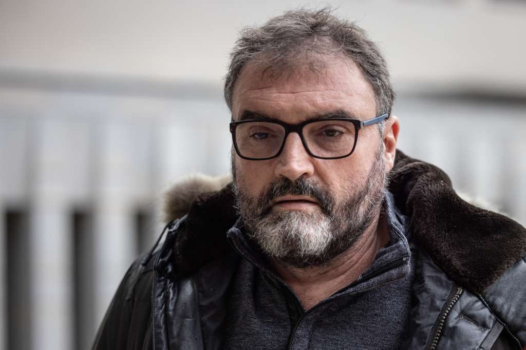 (FILES) Frederic Pechier, an anaesthetist now suspected of poisoning patients in 32 cases (with 13 lethal outcomes) at the Besancon hospital arrives at the Besancon courthouse on March 8, 2023.
