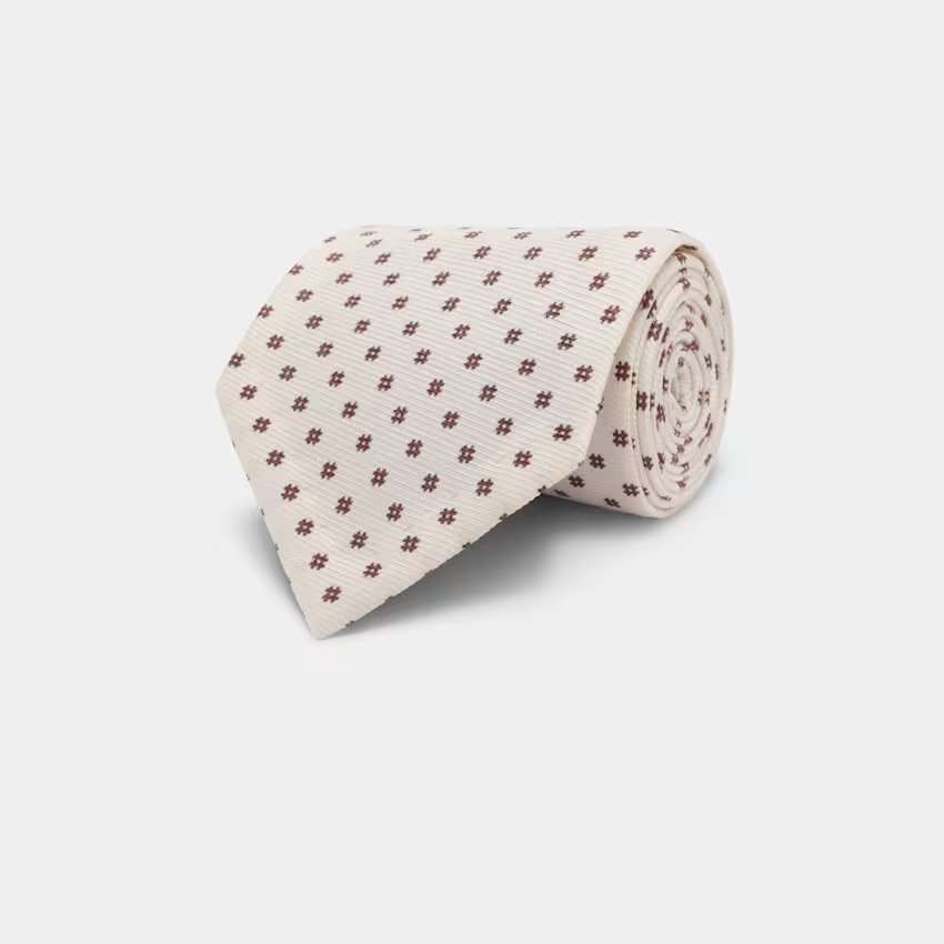 Corbata floreada color crudo