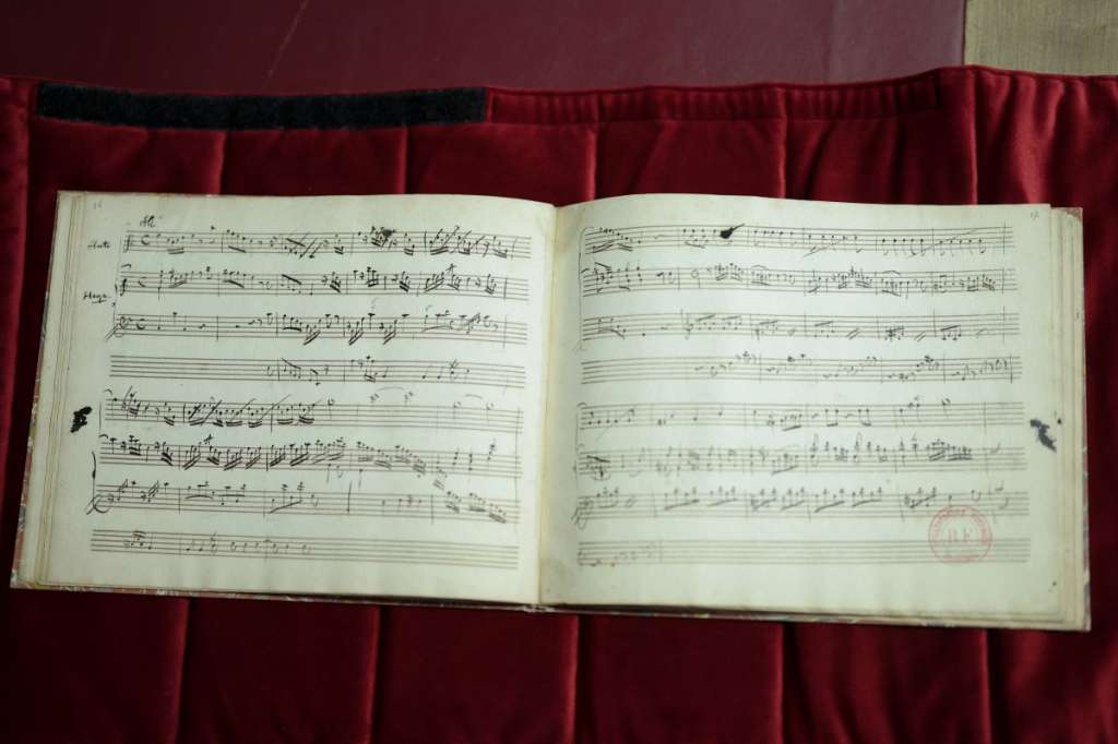 This photograph taken on June 15, 2026, shows an original fragment of Wolfgang Amadeus Mozart’s music handwritten notebook at Richelieu Library (Bibliotheque Nationale de France-National Library of France-BnF) in Paris.