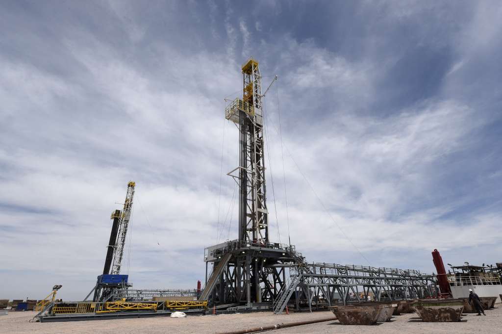 View of oil drilling rigs at Vaca Muerta Shale oil reservoir in Loma Campana, Argentina. Photographer: Juan Mabromata/AFP/Getty Images