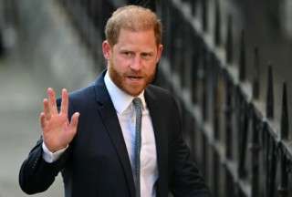 Britain's Prince Harry, Duke of Sussex waves as he arrives at the the Royal Courts of Justice, Britain's High Court, in central London, on April 8, 2025. Prince Harry will push ahead with a court challenge in London on Tuesday as the self-exiled royal fights a decision to downgrade his personal security when he visits Britain. Following Harry's dramatic split with the royal family in 2020 and subsequent move to North America, the British government said he would no longer be given the "same degree" of publicly funded protection when in the UK. (Photo by JUSTIN TALLIS / AFP)