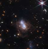 Telescopio James Webb capta un estallido de estrellas en una galaxia antigua