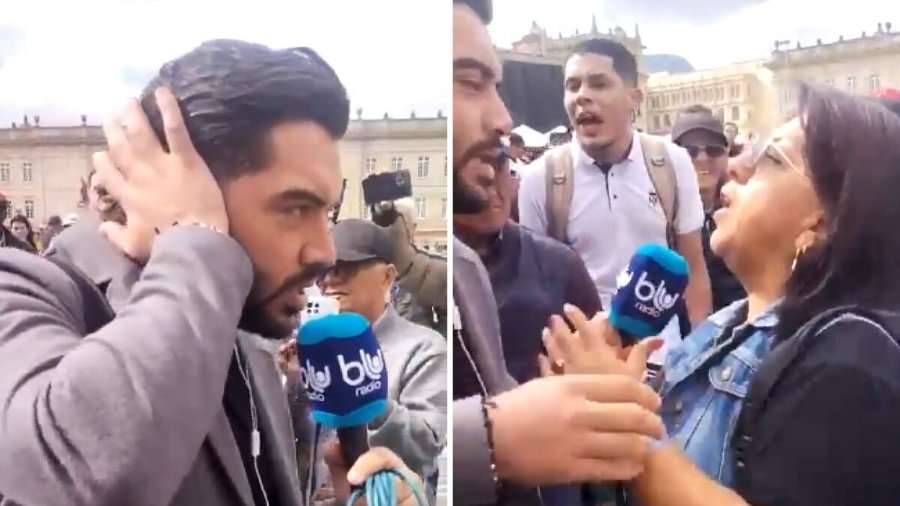 En el video publicado en redes por ese medio de comunicación se ve como una mujer trata de quitarle el micrófono al periodista para decir argumentos en contra de su presencia en el lugar.