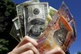 Venezuela enfrenta con subasta segunda devaluación en 50 días
