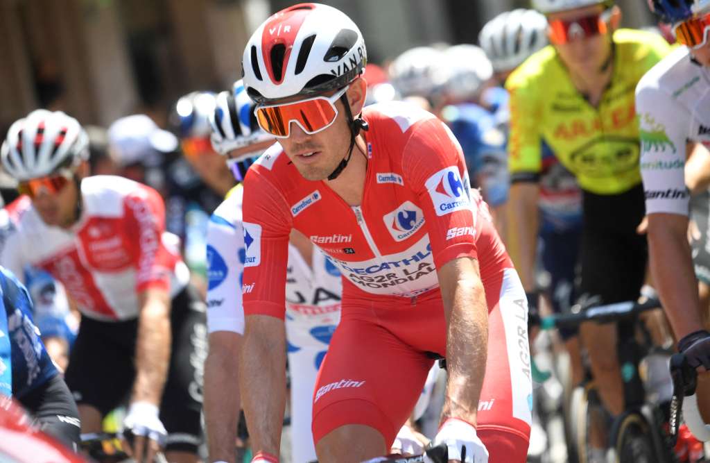 The overall ranking leader, Team Decathlon-AG2R La Mondiale's Ben O'Connor rides in Ponteareas on August 27, 2024, during the start of the stage 10 of La Vuelta a Espana cycling tour, a 160 km race between Ponteareas and Baiona. (Photo by MIGUEL RIOPA / AFP)