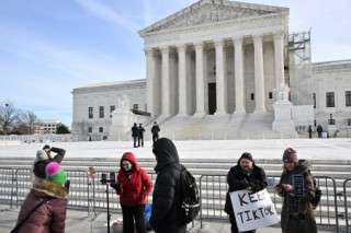 Supporters of Tiktok livestream in front of the US Supreme Court in Washington, DC, on January 10, 2025.