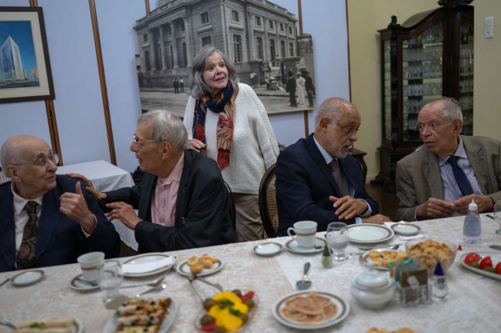 Brazilian writer Rosiska Darcy de Oliveira greets other members of the Brazilian Academy of Letters (ABL in Portuguese) as she arrive to the tea room of the historical building Petit Trianon, in Rio de Janeiro, Brazil, on June 13, 2024. Rosiska Darcy de Oliveira is an immortal member of the Brazilian Academy of Letters (ABL in Portuguese) since 2013.
