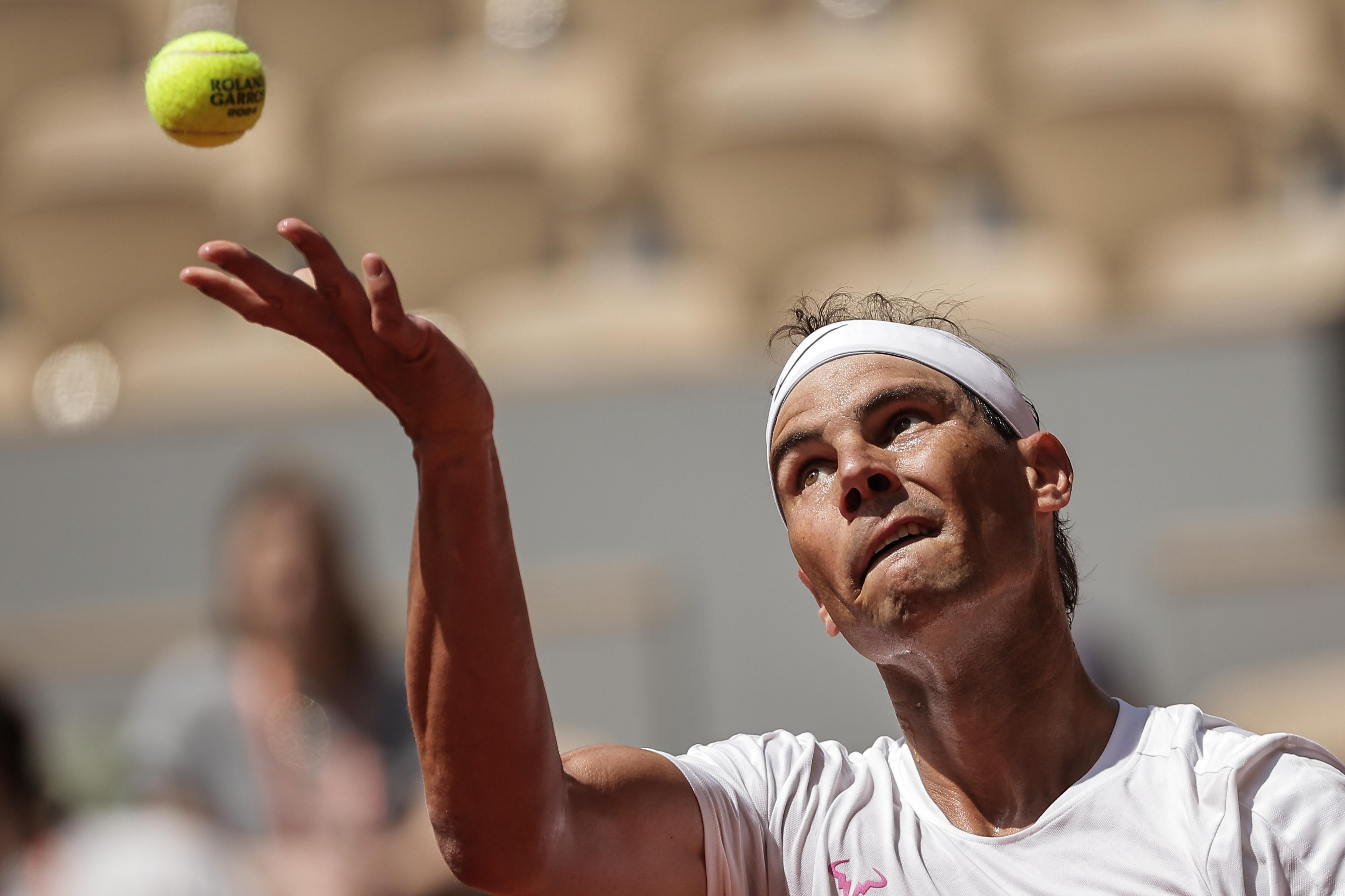 Paris (France), 21/05/2024.- Rafael Nadal of Spain in action during a training session open to the public on the Philippe Chatrier court at Roland Garros in Paris, France, 21 May 2024. The 123th French Open tennis tournament starts with its first round matches on 26 May 2024. (Tenis, Abierto, Francia, España) EFE/EPA/CHRISTOPHE PETIT TESSON