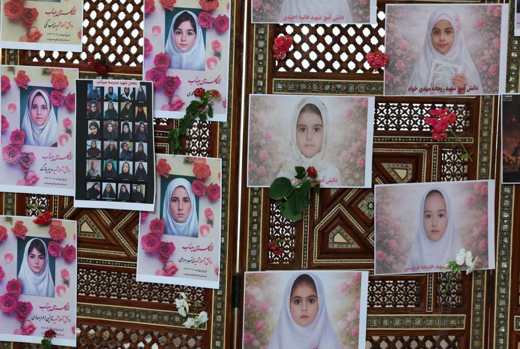 Tunis (Tunisia), 12/03/2026.- Photos of schoolchildren from the Shajarah Tayyebeh primary school who died in a bombing are displayed during the press conference of Iranian Ambassador to Tunisia, Massoud Hosseinian, at the Iranian Embassy in Tunis, Tunisia, 12 March 2026. Hosseinian addressed the current situation in Iran following the US-Israeli bombings and accused the US army of the February 28 bombing of the Shajarah Tayyebeh primary school in Minab, in the south of the country, which killed more than 150 people, according to Iranian authorities. (Túnez, Túnez) EFE/EPA/MOHAMED MESSARA