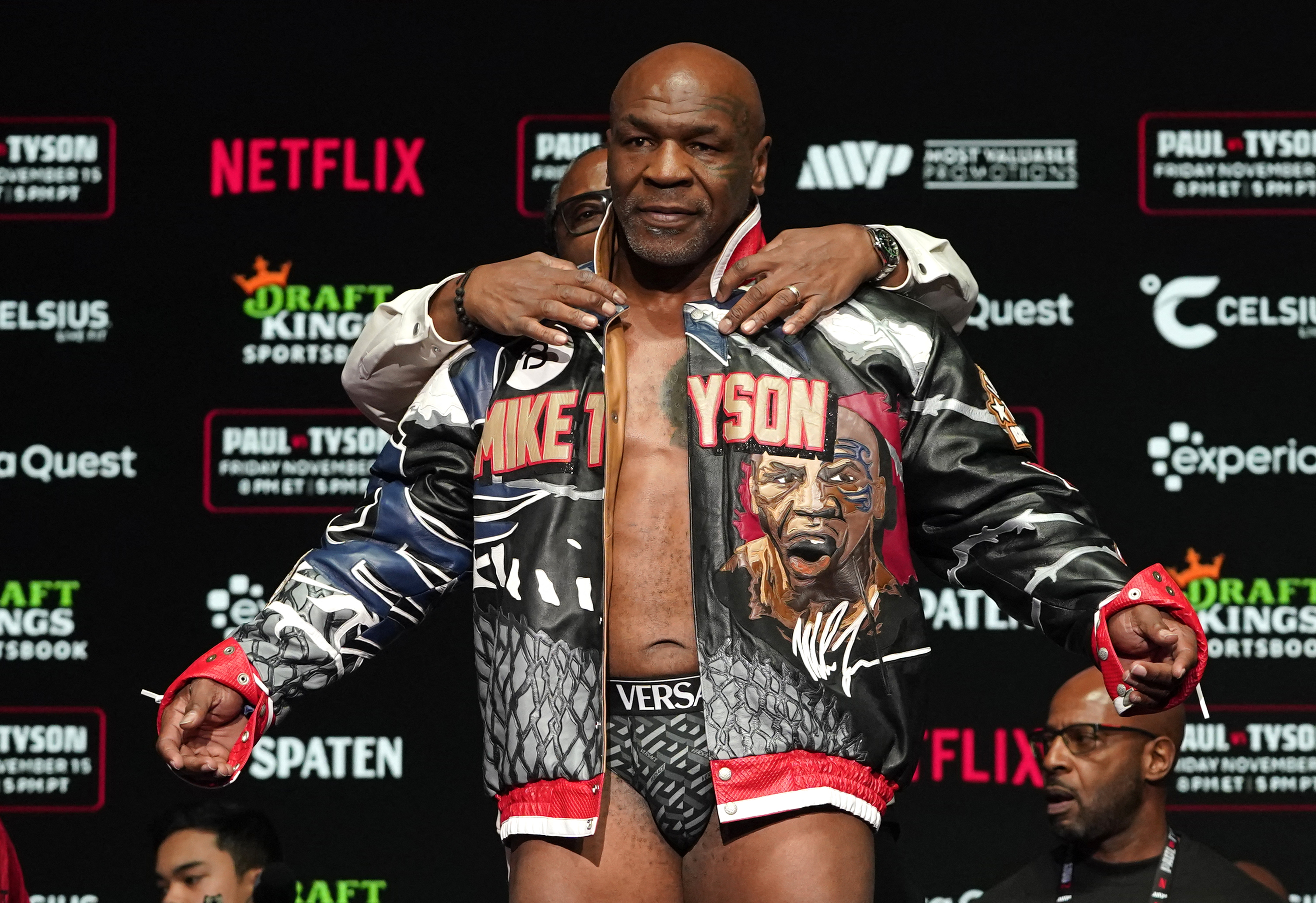 US boxer Mike Tyson takes part in a weigh-in ahead of his heavyweight boxing fight against US boxer and actor Jake Paul at The Pavilion at Toyota Music Factory in Irving, Texas, on November 14, 2024. (Photo by TIMOTHY A. CLARY / AFP)