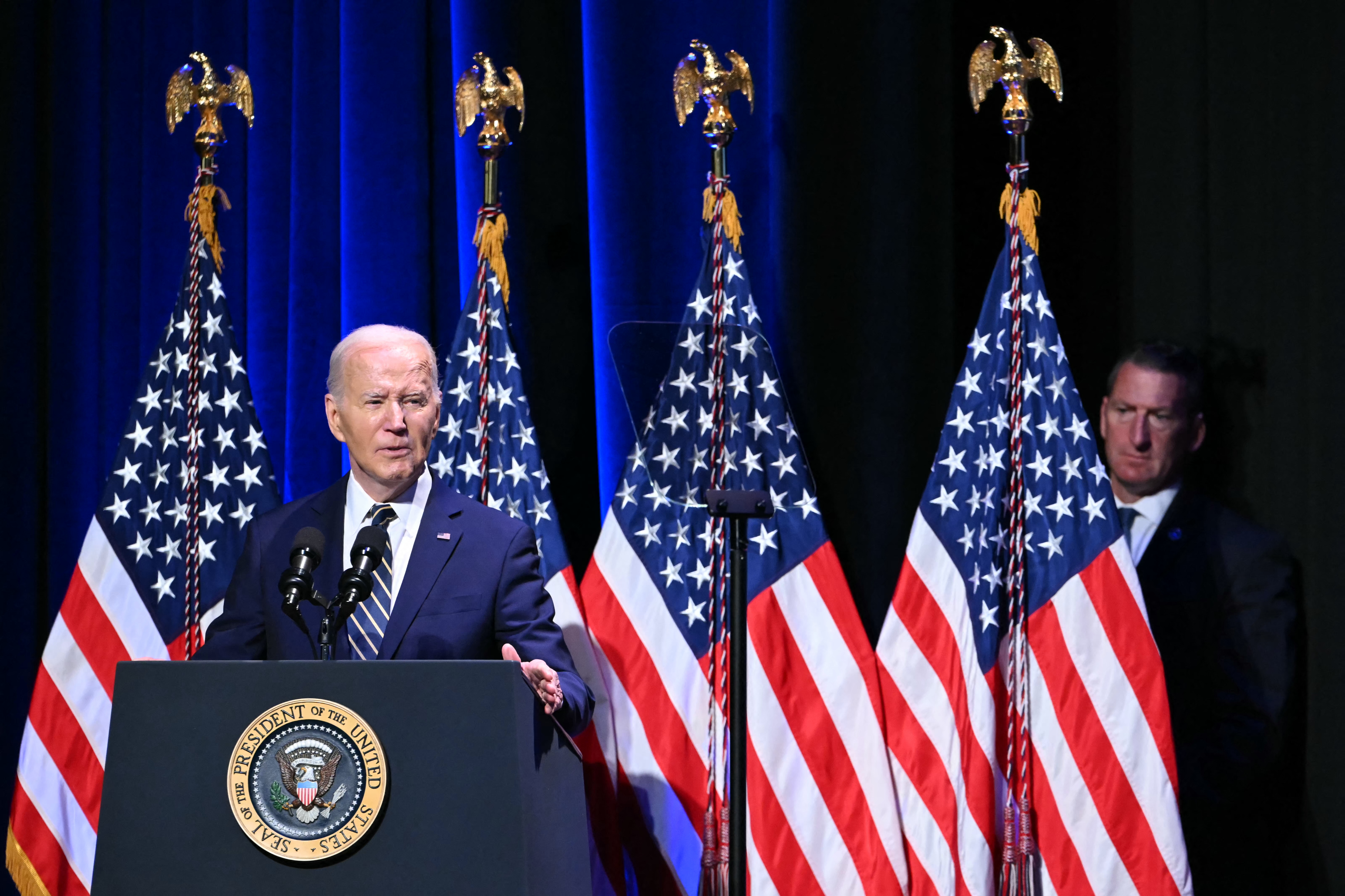 TOPSHOT - US President Joe Biden speaks at the National Museum of African American History and Culture in Washington, DC, on May 17, 2024. (Photo by ANDREW CABALLERO-REYNOLDS / AFP)