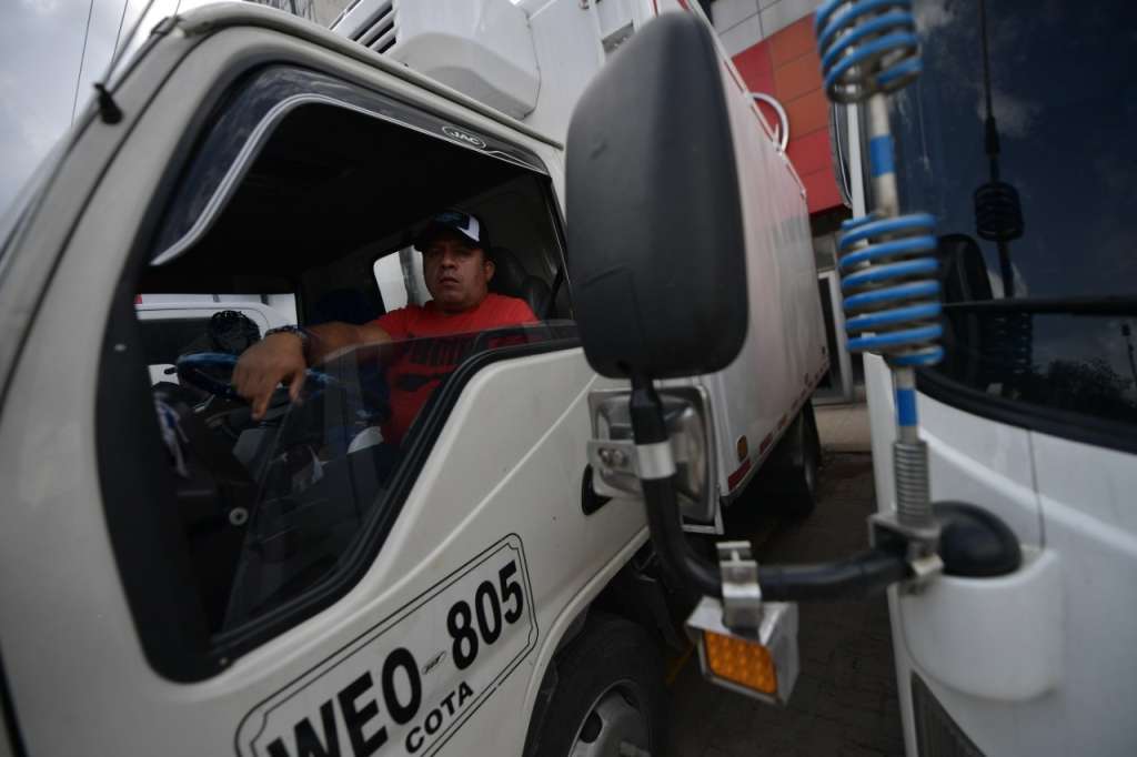 Fotografías de la movilización convocada por camioneros este lunes en Bogotá.