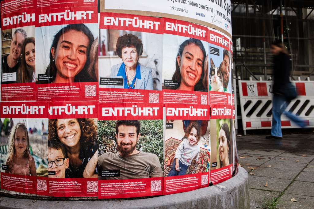 Berlin (Germany), 25/10/2023.- Fliers showing currently missing people who were kidnapped by Hamas in Israel, are pasted on an advertising column in Berlin, Germany, 25 October 2023. According to the Israel Defence Forces (IDF), more than 200 people, both Israelis and foreign nationals, were taken hostage by Hamas on 07 October, when the militant group launched an unprecedented attack on Israel from the Gaza Strip. Four hostages were released as of 25 October. (Alemania) EFE/EPA/CLEMENS BILAN