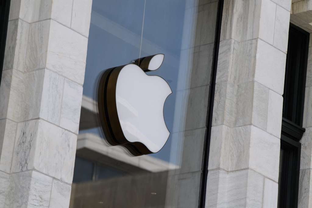 (FILES) The Apple logo is seen at the entrance of an Apple store in Washington, DC, on September 14, 2021.