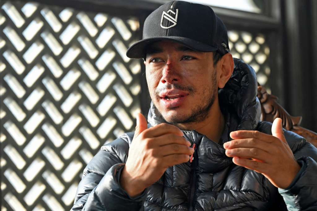 (FILES) In this picture taken on January 21, 2021, Nepali mountaineer Nirmal Purja speaks during an interview with AFP in Skardu, a city district of the Gilgit-Baltistan region in northern Pakistan.