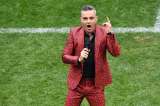 Robbie Williams quiere contratar a un detective para encontrar a su excompañero Jason Orange