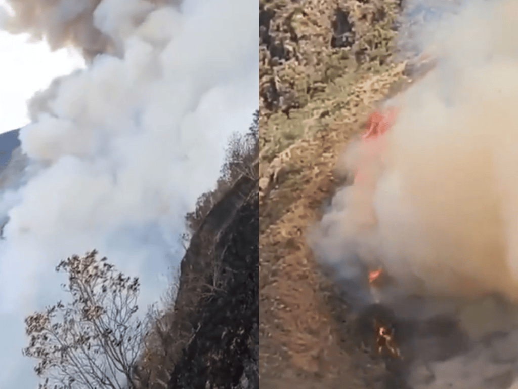 Bomberos y brigadistas permanecen desplegados en el área montañosa, donde las condiciones del terreno dificultan el acceso y las llamas han vuelto a reactivarse en varios puntos.