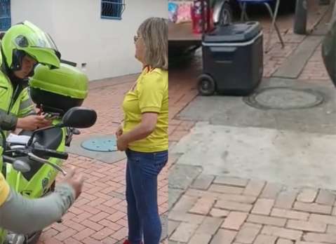 Video: vendedora ambulante recibió comparendo por tapar un hueco en Bogotá