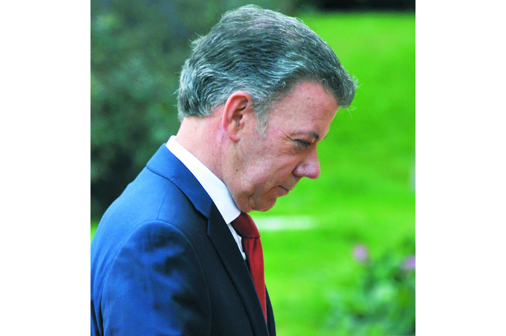 La U, partido del presidente Santos, busca darle luz verde al transfuguismo en la reforma política. / AFP