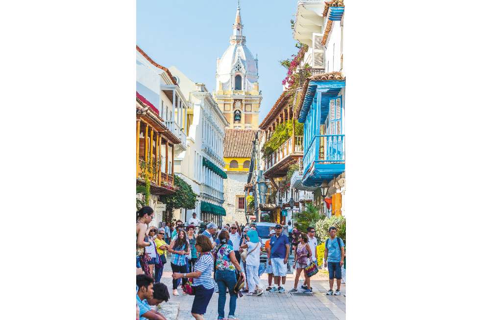 Múltiples estilos de vestir se ven por estos días en la turística Cartagena. / iStock