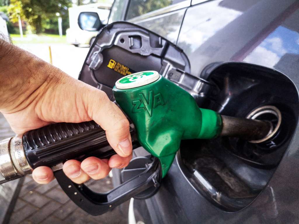 A man fills up his car at a gas station in Moscow on September 8, 2025.