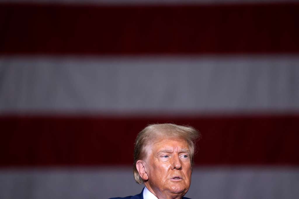 TOPSHOT - Former US President and Republican presidential candidate Donald Trump speaks about the economy during a campaign event in Potterville, Michigan, on August 29, 2024. (Photo by JEFF KOWALSKY / AFP)