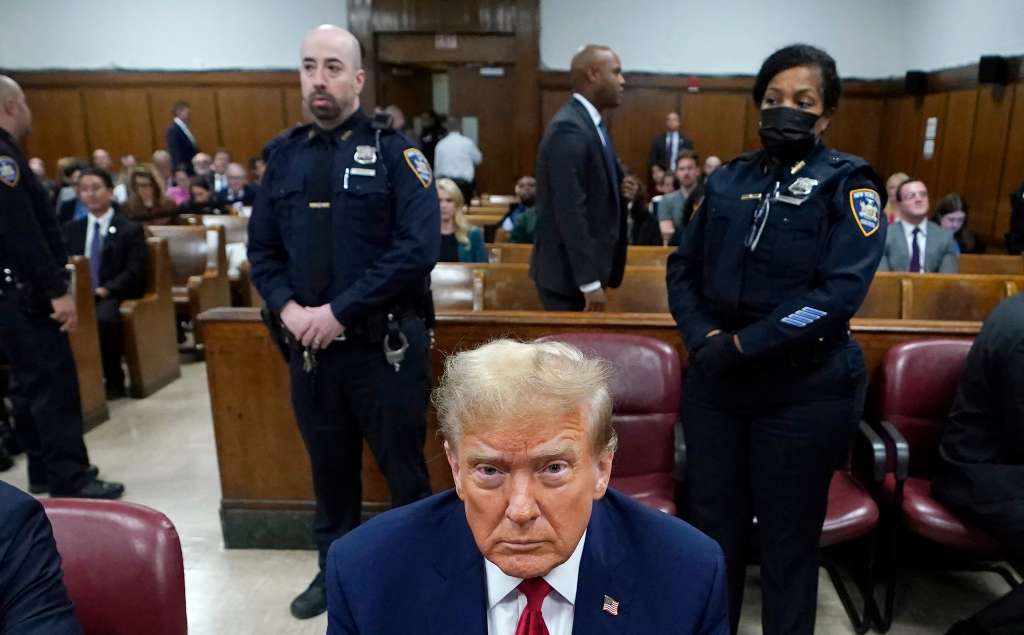 (FILES) Former US President Donald Trump attends his trial for allegedly covering up hush money payments linked to extramarital affairs, at Manhattan Criminal Court in New York City on April 23, 2024.