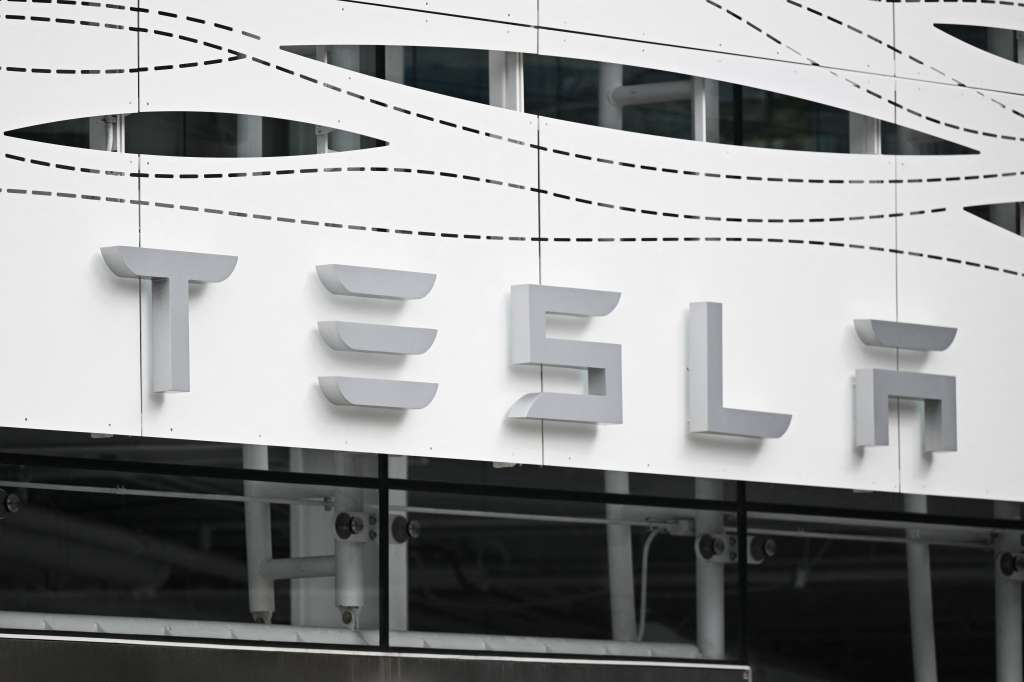 (FILES) The Tesla logo is seen at the Santa Monica Place store in Santa Monica, California, on March 20, 2023.