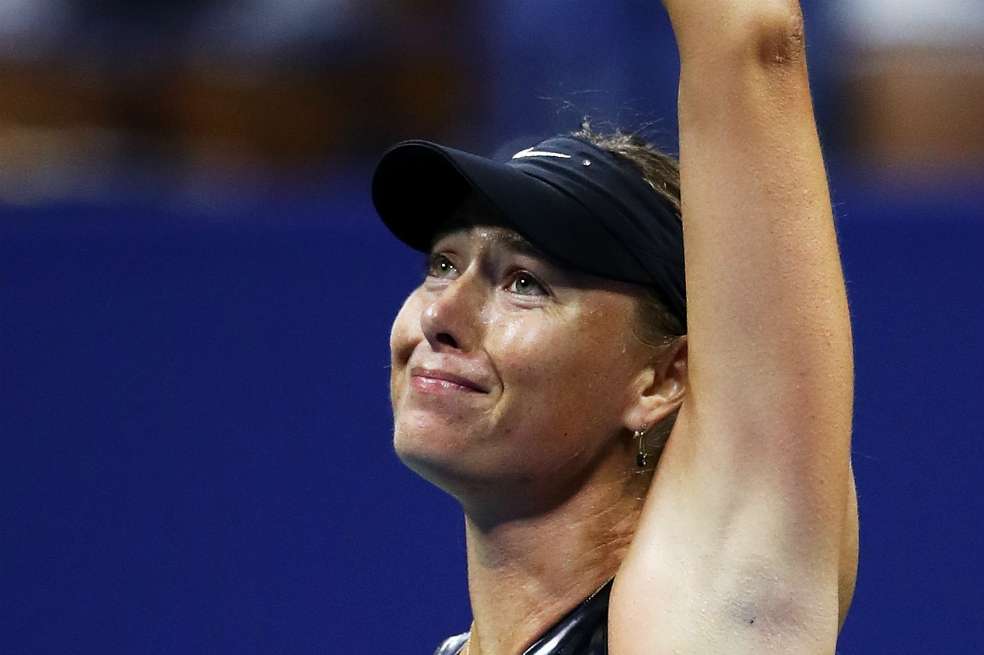 La tenista rusa María Sharapova celebra este lunes tras ganar en su debut en el US Open. / AFP