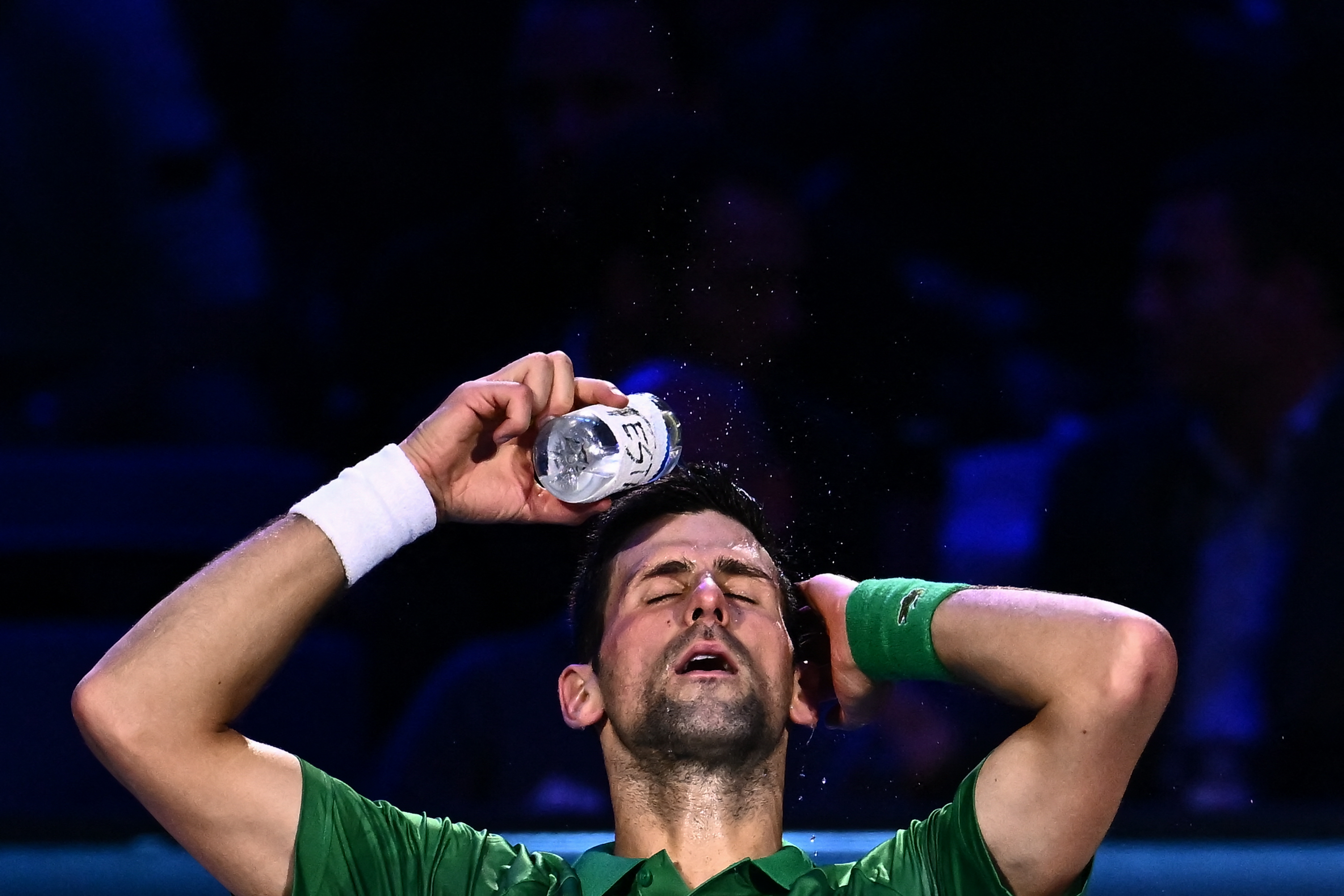 Serbia's Novak Djokovic celebrates after winning his semi-final match against USA's Taylor Fritz