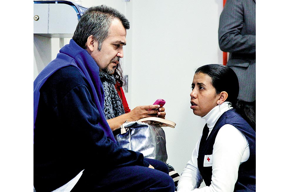 John Jairo Guzmán, a su regreso al aeropuerto El Dorado de Bogotá. / AFP