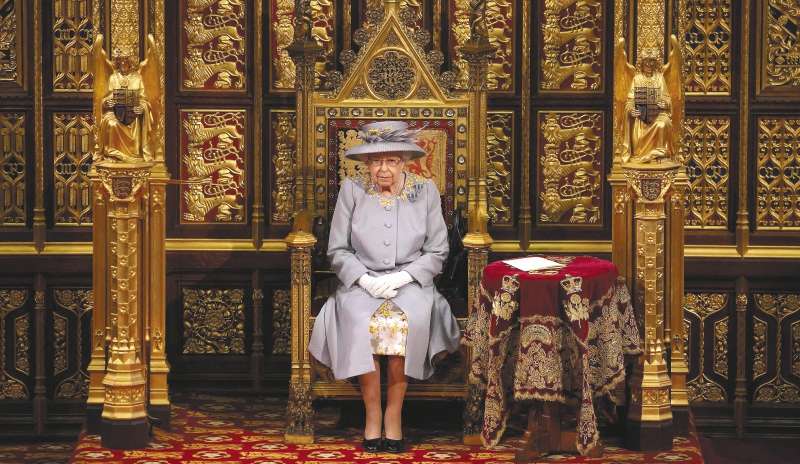 (FILES) In this file photo taken on May 11, 2021 Britain's Queen Elizabeth II sits on the The Sovereign's Throne in the House of Lords chamber during the State Opening of Parliament at the Houses of Parliament in London, which is taking place with a reduced capacity due to Covid-19 restrictions. The doctors of Queen Elizabeth II, 96, are "concerned" about her health and "have recommended that she be placed under medical supervision" at her castle in Balmoral, Scotland, Buckingham Palace said on September 8, 2022. "Following a further assessment this morning, the Queen's doctors are concerned for Her Majesty's health and have recommended that she remains under medical supervision. The Queen continues to be comfortable and at Balmoral," the palace said in a brief statement. (Photo by Chris Jackson / POOL / AFP)