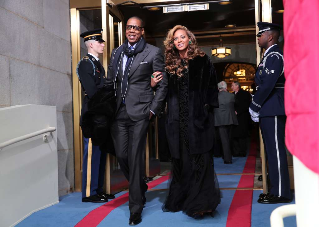 WASHINGTON, DC - JANUARY 21: Recording artists Jay-Z and Beyonce arrive at the presidential inauguration on the West Front of the U.S. Capitol January 21, 2013 in Washington, DC. Barack Obama was re-elected for a second term as President of the United States. Win McNamee/Getty Images/AFP