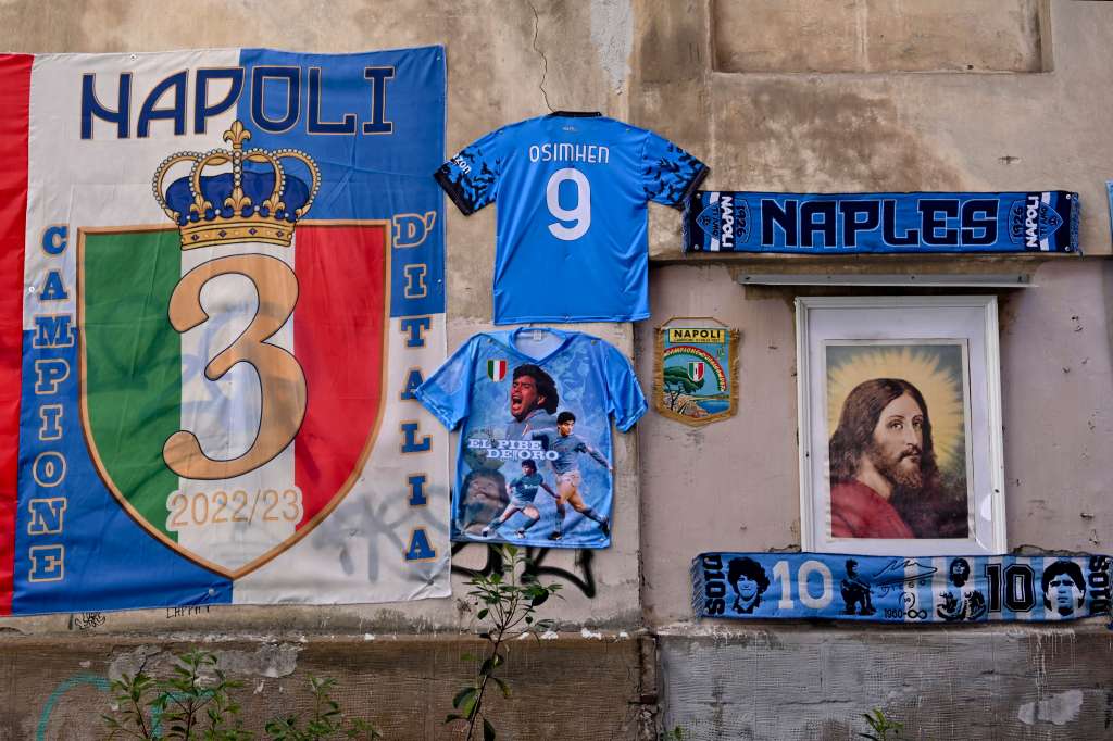 Naples (Italy), 26/04/2023.- Napoli scarves and jerseys hang from a wall in forestalling celebrations of Napoli's anticipated Serie A title, in Naples, Italy, 26 April 2023. (Italia, Nápoles) EFE/EPA/CIRO FUSCO