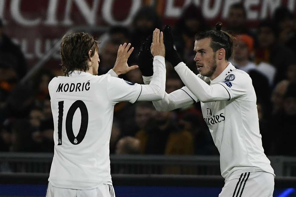 Luka Modric y Gareth Bale (der.), futbolistas del Real Madrid. / AFP