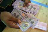 Argentina, donde las casas se compran con fajos de billetes de 100 dólares