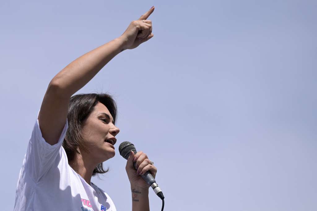 (FILES) Brazil's former First Lady (2019-2022) Michelle Bolsonaro delivers a speech as she drives on top of a truck during an anti-abortion rally organized by PL Mulher group at Praca da Liberdade square in Belo Horizonte, state of Minas Gerais, Brazil, on October 8, 2023.