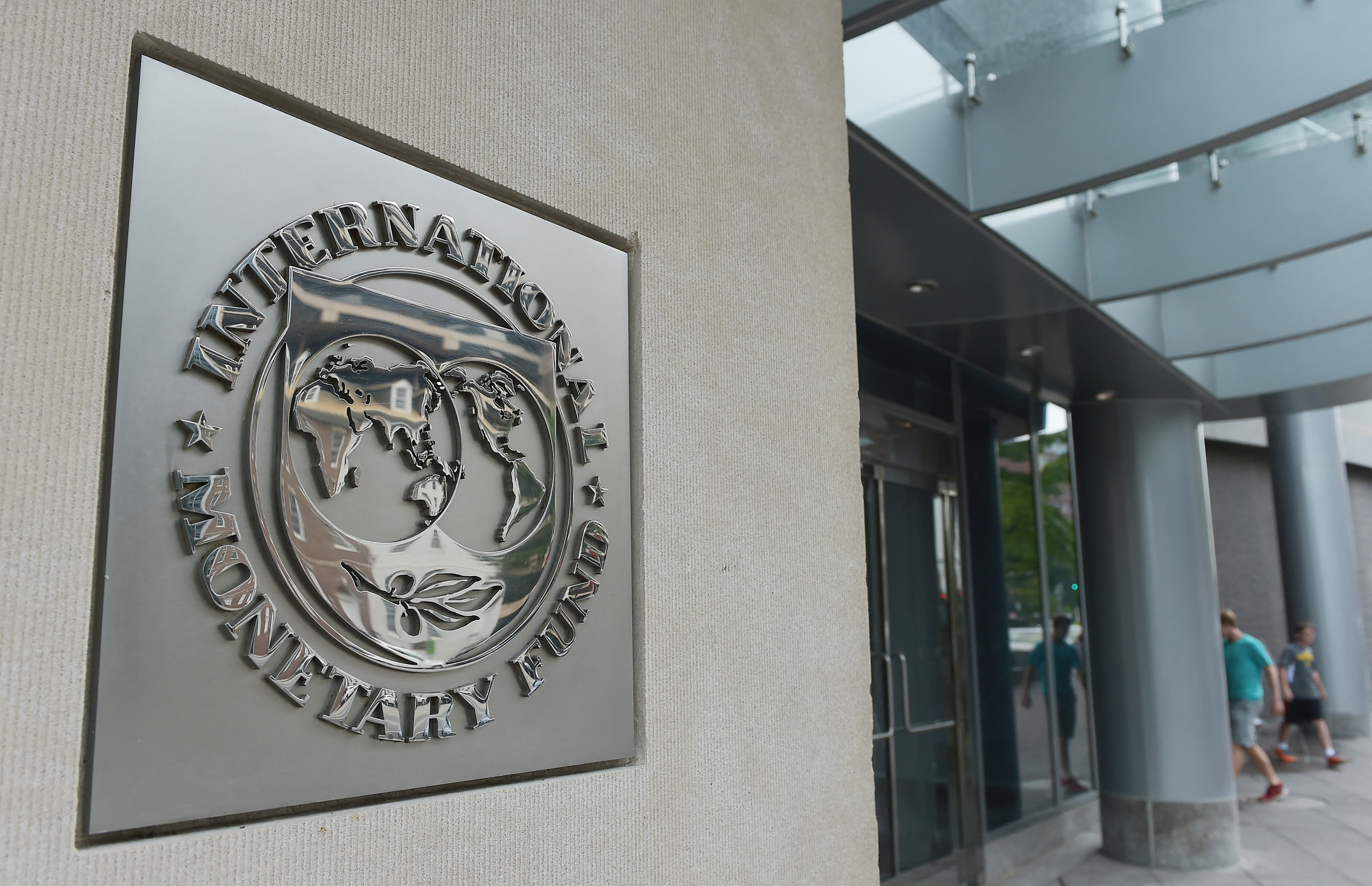 (FILES) The seal of the International Monetary Fund (IMF) at their headquarters building in Washington, DC, on July 5, 2015.