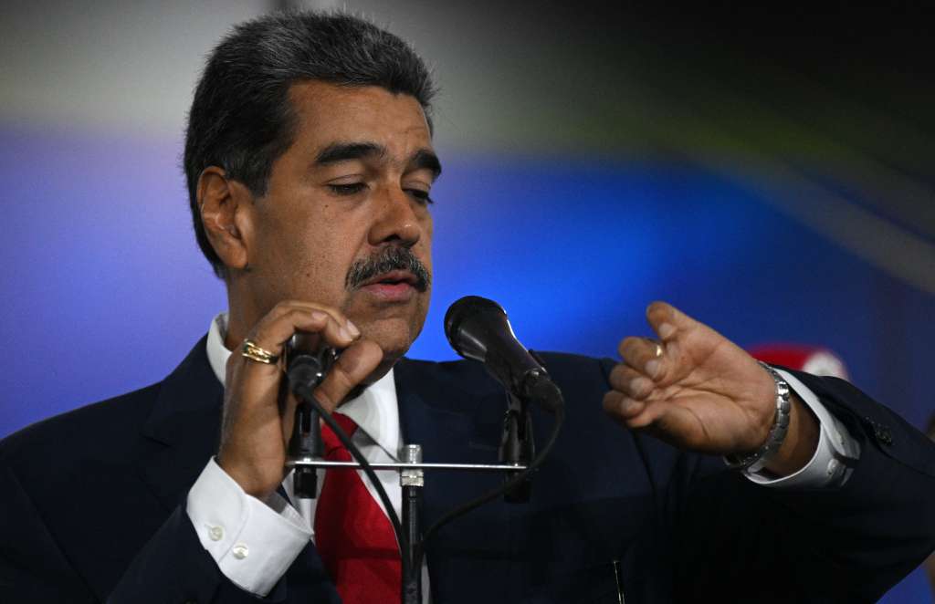 TOPSHOT - Venezuelan President Nicolas Maduro gestures as he speaks with the media at the Venezuela's Supreme Court of Justice (TSJ) in Caracas on August 2, 2024.