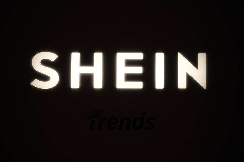 (FILES) This photograph shows the logo Shein during the Urban Ritual fashion show Fall-Winter 2025/26 organized by Chinese fashion giant Shein in Milan, on October 16, 2025.