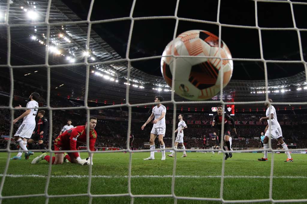 Leverkusen (Germany), 21/09/2023.- Goalkeeper Andrey Lunev (L) of Qarabag concedes the 1-2 goal by Leverkusen'Äôs Jeremy Frimpong (unseen) during the UEFA Europa League Round of 16, second leg soccer match between Bayer 04 Leverkusen and Qarabag FK, in Leverkusen, Germany, 14 March 2024. (Alemania) EFE/EPA/CHRISTOPHER NEUNDORF