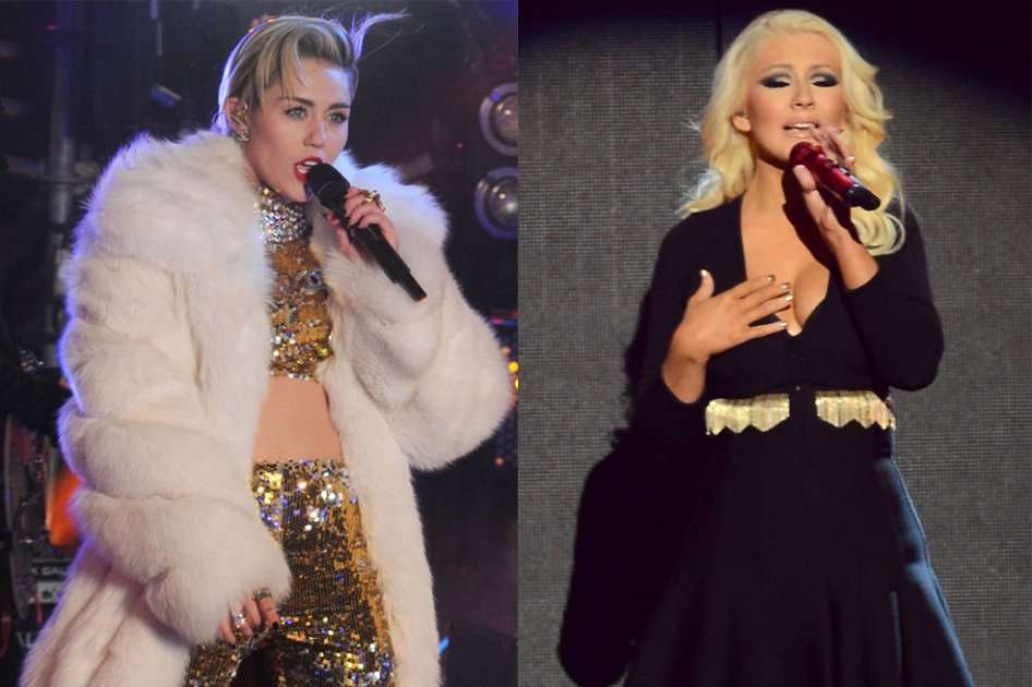 Las cantantes Miley Cyrus y Christina Aguilera.