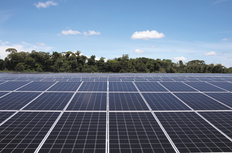 Solar panels in a field in Colombia. Photographer: Nicolo Filippo Rosso/Bloomberg