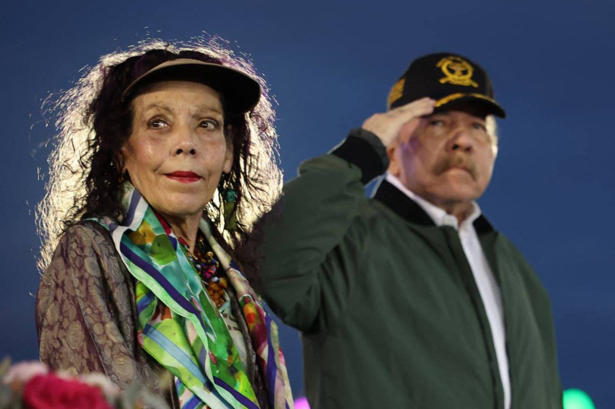 This handout picture released by the official El 19 Digital news outlet on September 2, 2025, shows Nicaraguan Co-President Rosario Murillo (L) and President Daniel Ortega (R) attending the parade for the 46th Anniversary of the National Army in Managua. (Photo by Jairo CAJINA / El 19 DIGITAL / AFP) / RESTRICTED TO EDITORIAL USE - MANDATORY CREDIT "AFP PHOTO / EL 19 DIGITAL / JAIRO CAJINA" - HANDOUT - NO MARKETING NO ADVERTISING CAMPAIGNS - DISTRIBUTED AS A SERVICE TO CLIENTS - AFP CANNOT INDEPENDENTLY VERIFY THE AUTHENTICITY OR LOCATION, DATE, AND CONTENT OF THESE IMAGES.