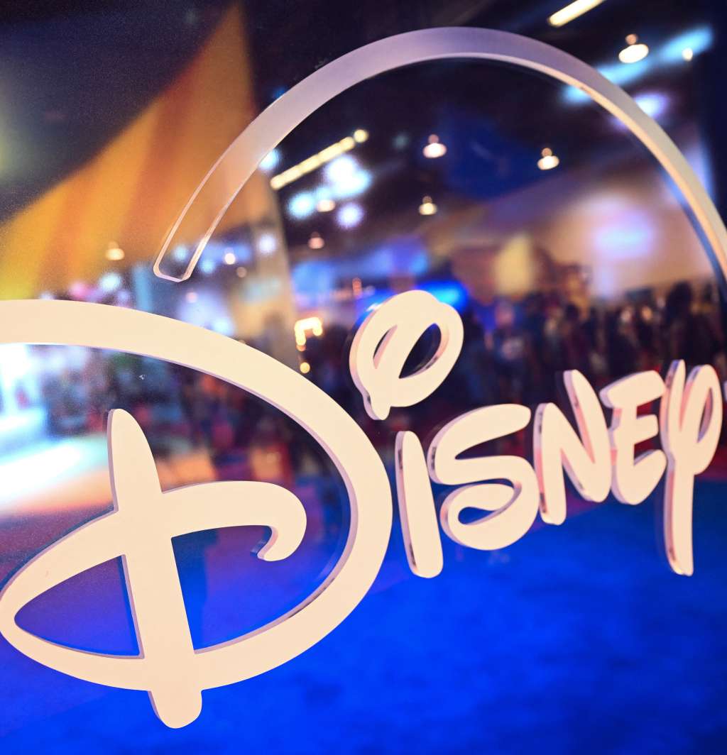 (FILES) Fans are reflected in Disney+ logo during the Walt Disney D23 Expo in Anaheim, California on September 9, 2022.