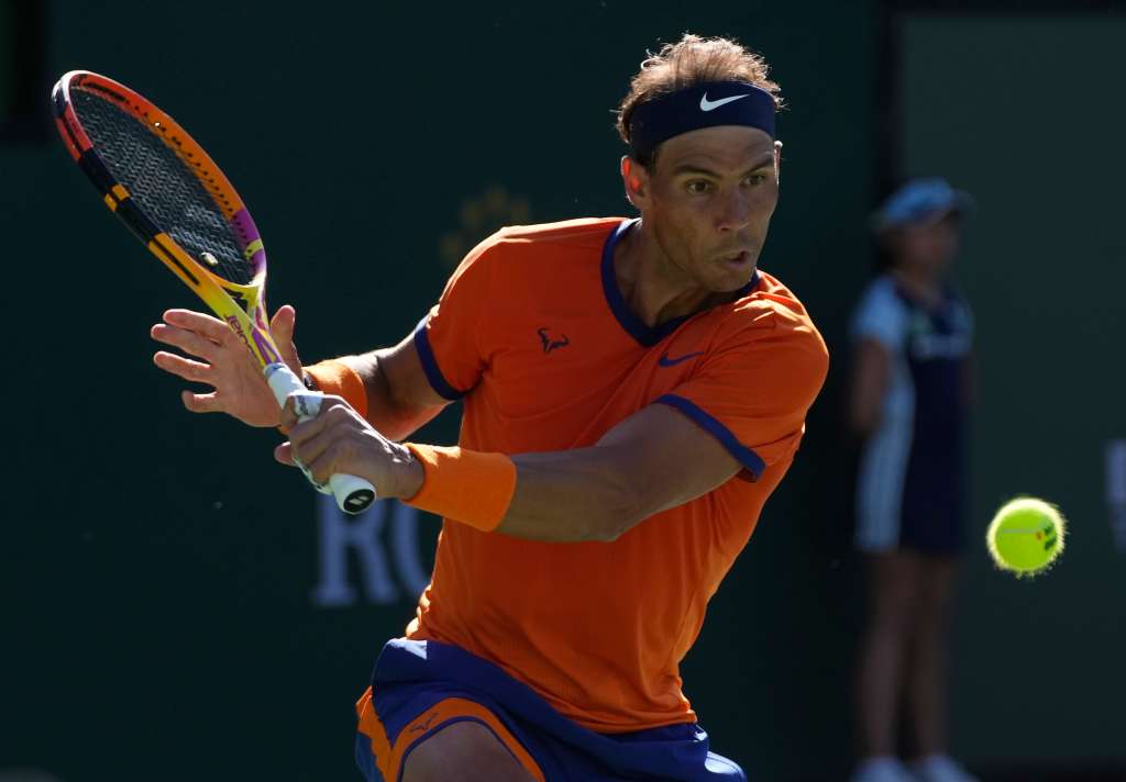 Indian Wells (United States), 17/03/2022.- Rafael Nadal of Spain in action against Nick Kyrgios of Australia during the BNP Paribas Open tennis tournament at the Indian Wells Tennis Garden in Indian Wells, California, USA, 17 March 2022. The tennis tournament runs from 07-20 March 2022. (Tenis, Abierto, España, Estados Unidos) EFE/EPA/RAY ACEVEDO