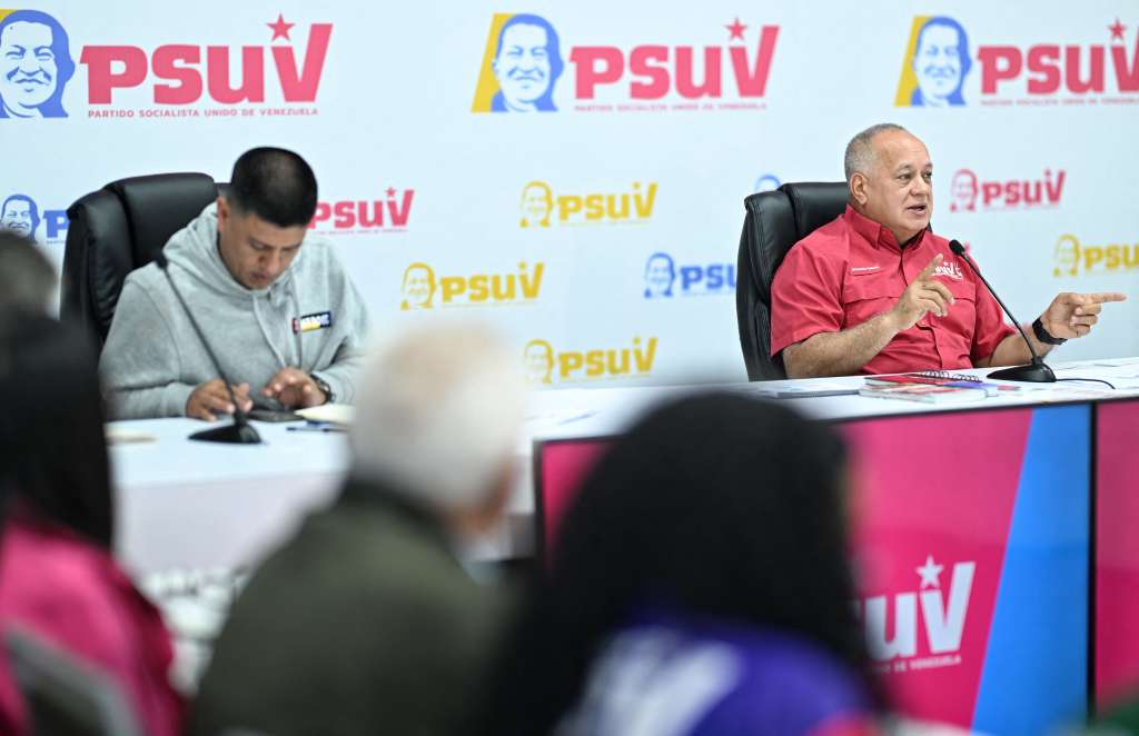 Venezuela's Interior Minister Diosdado Cabello (R) speaks on the Venezuela-Guyana dispute over the Esequibo region during press conference in Caracas on March 13, 2025.